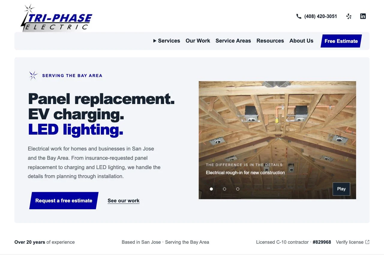 New Tri-Phase Electric homepage featuring panel replacement, EV charging, LED lighting, and a real construction wiring photograph